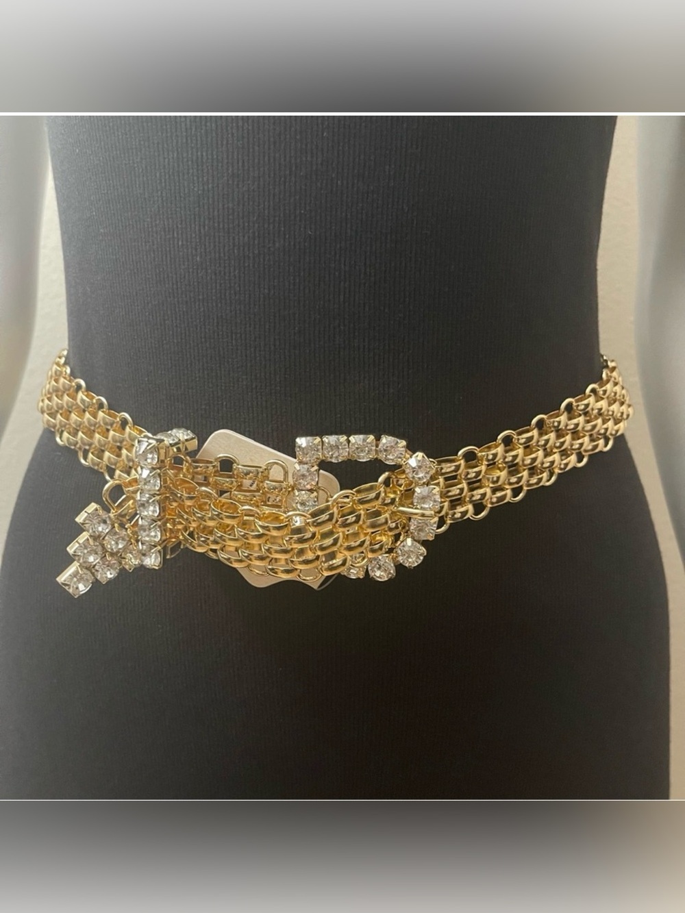Gold tone metallic chained with rhinestones details skinny belt